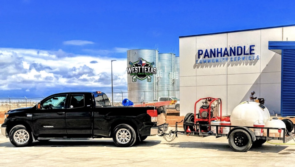 Heath Dodge's mobile power washing setup - black truck with professional equipment trailer